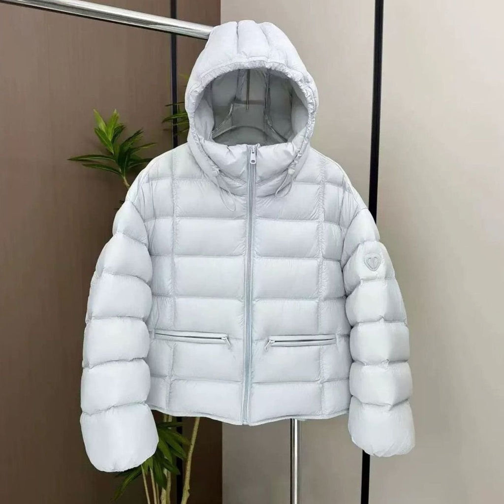 Emilia | Veste courte thermique pour femmes avec capuche et poches zippées