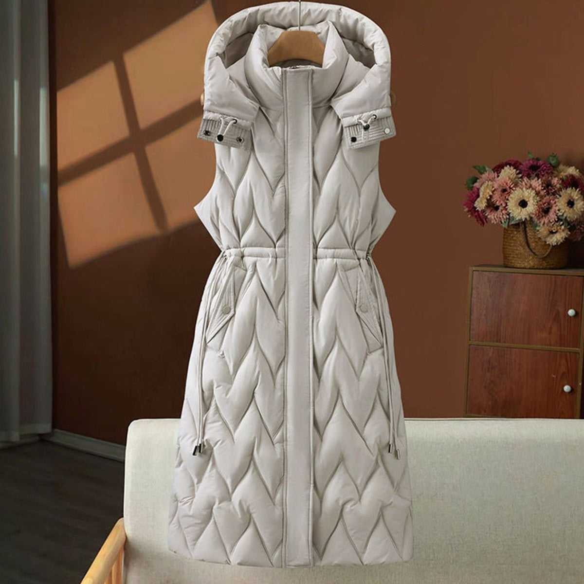 Annika | Gilet long matelassé pour femmes avec capuche et cordon de taille