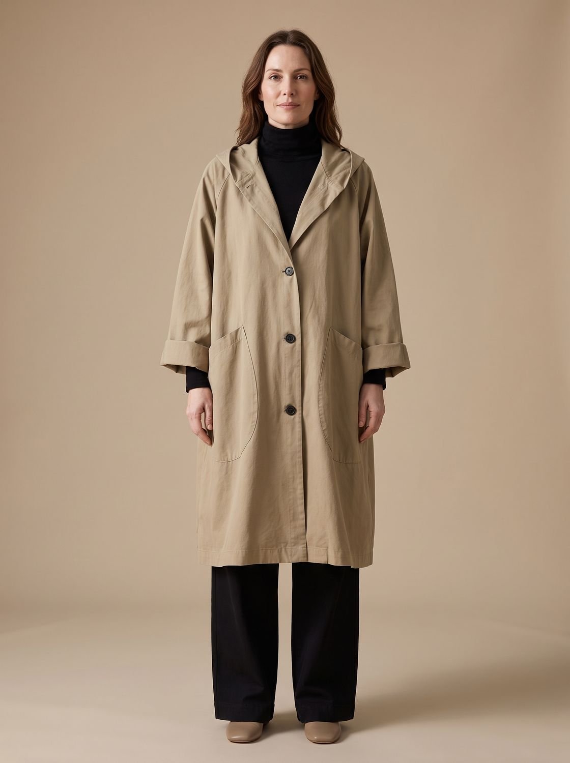 Annika | Manteau long oversize à capuche pour femmes avec patte de boutonnage et poches plaquées