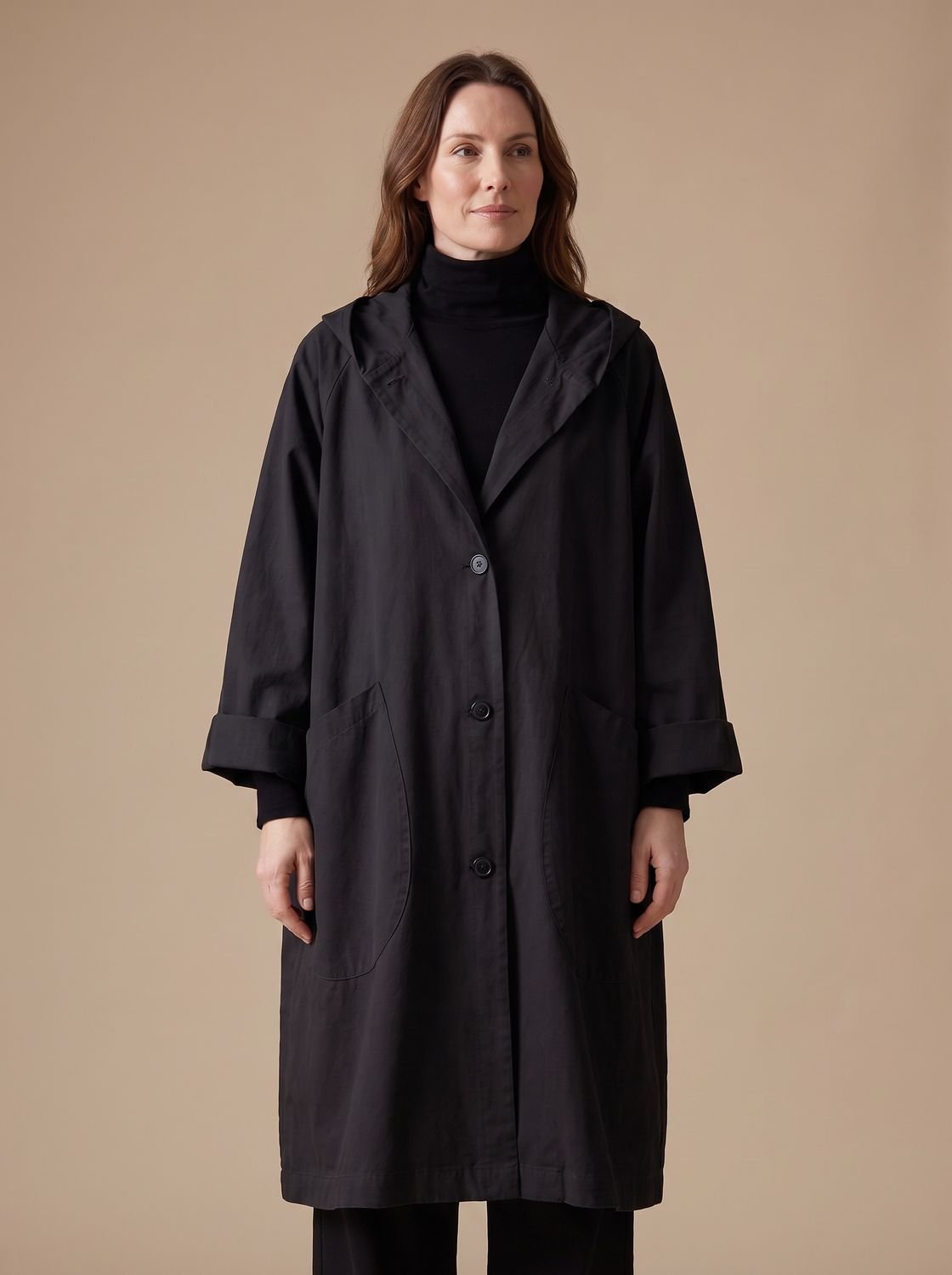 Annika | Manteau long oversize à capuche pour femmes avec patte de boutonnage et poches plaquées