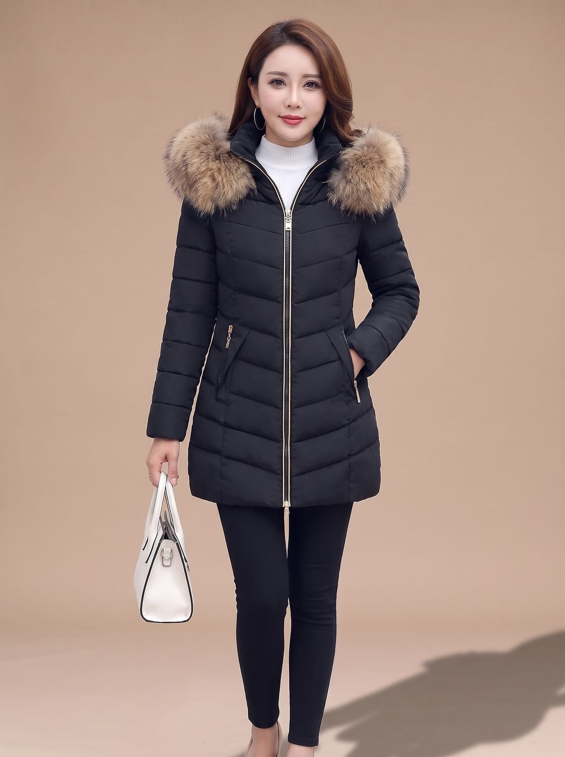 Sophie | Veste matelassée femme ajustée avec capuche en fausse fourrure