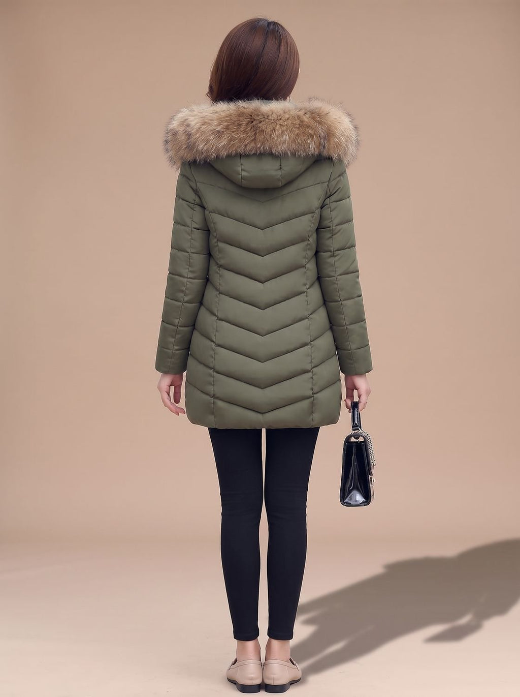 Sophie | Veste matelassée femme ajustée avec capuche en fausse fourrure