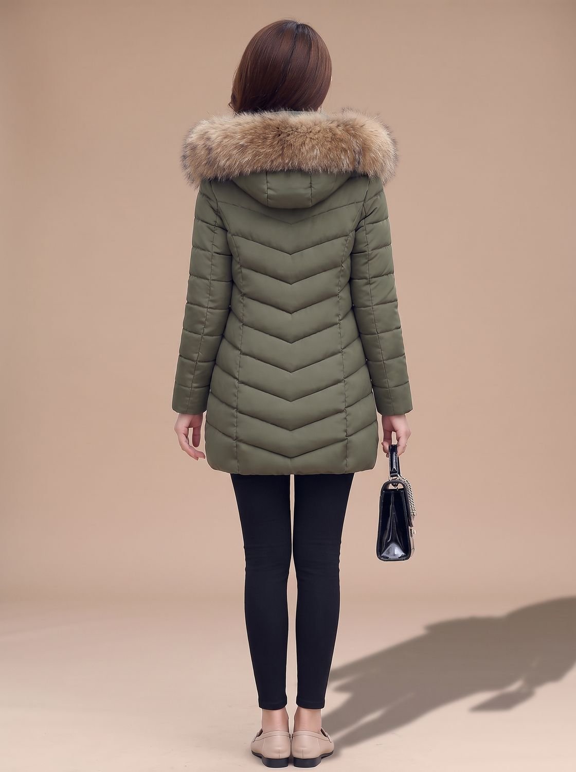 Sophie | Veste matelassée femme ajustée avec capuche en fausse fourrure