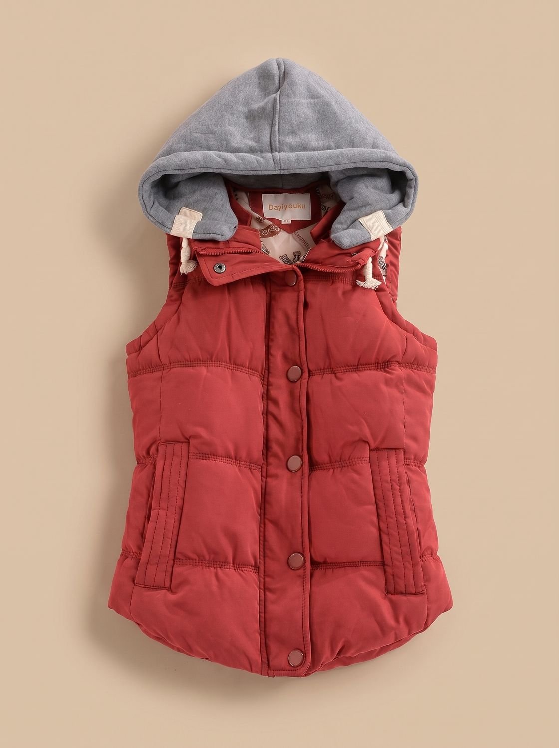 Charlotte | Gilet matelassé pour femmes avec capuche contrastante et patte de boutonnage à pressions