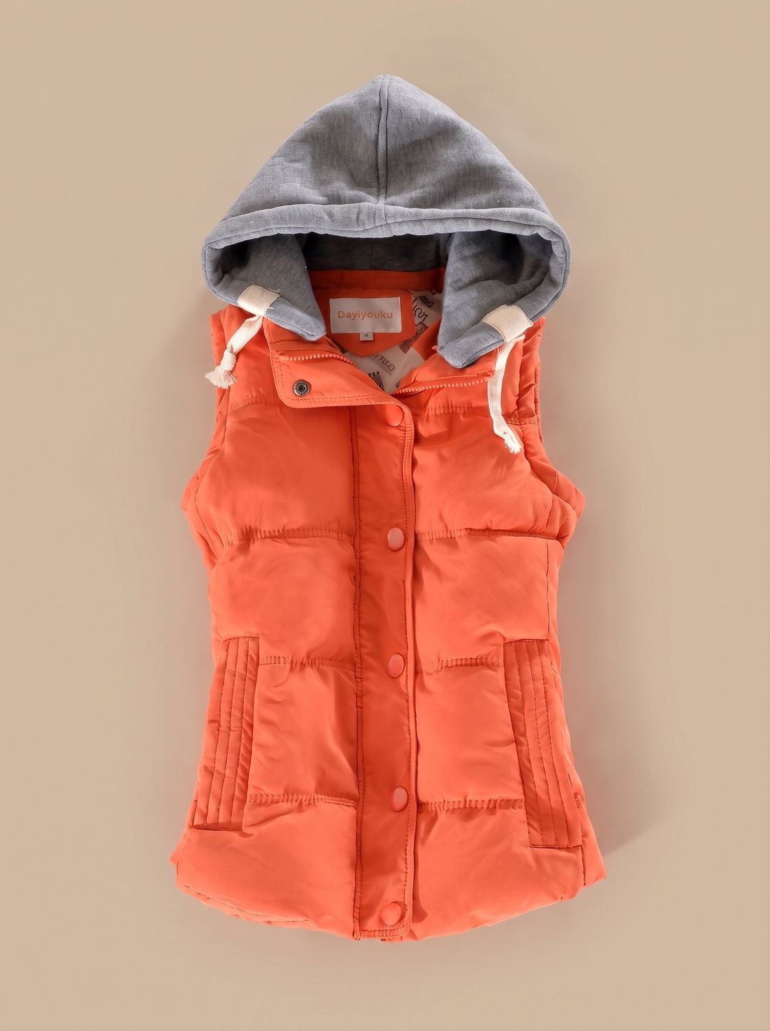 Charlotte | Gilet matelassé pour femmes avec capuche contrastante et patte de boutonnage à pressions