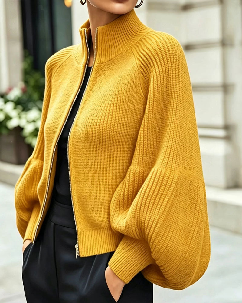 Manteau à col montant et manches lanternes avec fermeture éclair
