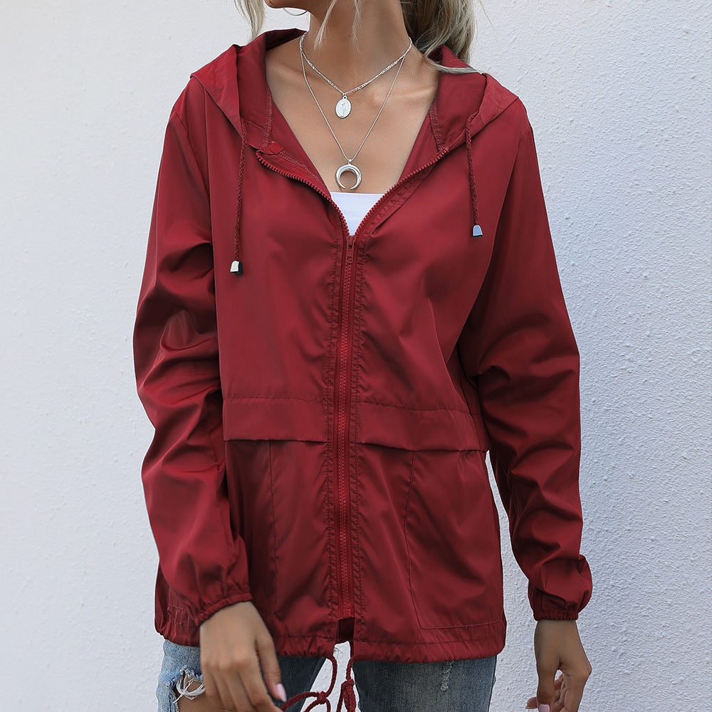 Manteau de pluie pour femmes avec capuche et cordon de serrage