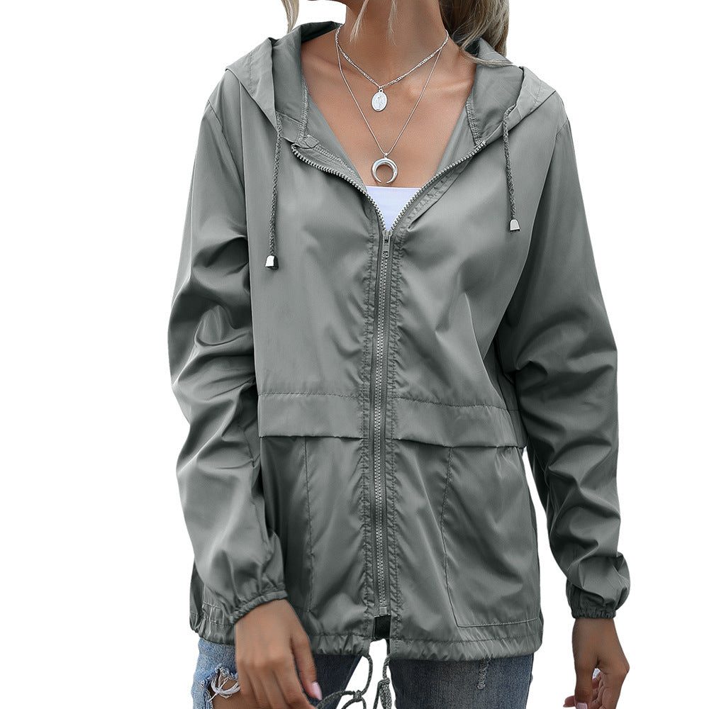 Manteau de pluie pour femmes avec capuche et cordon de serrage