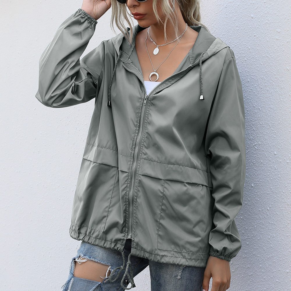 Manteau de pluie pour femmes avec capuche et cordon de serrage