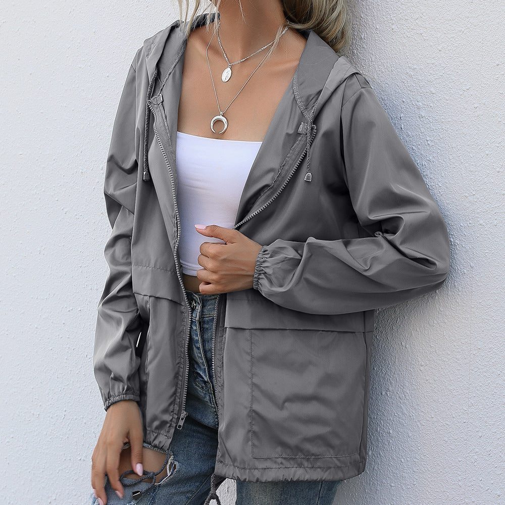 Manteau de pluie pour femmes avec capuche et cordon de serrage