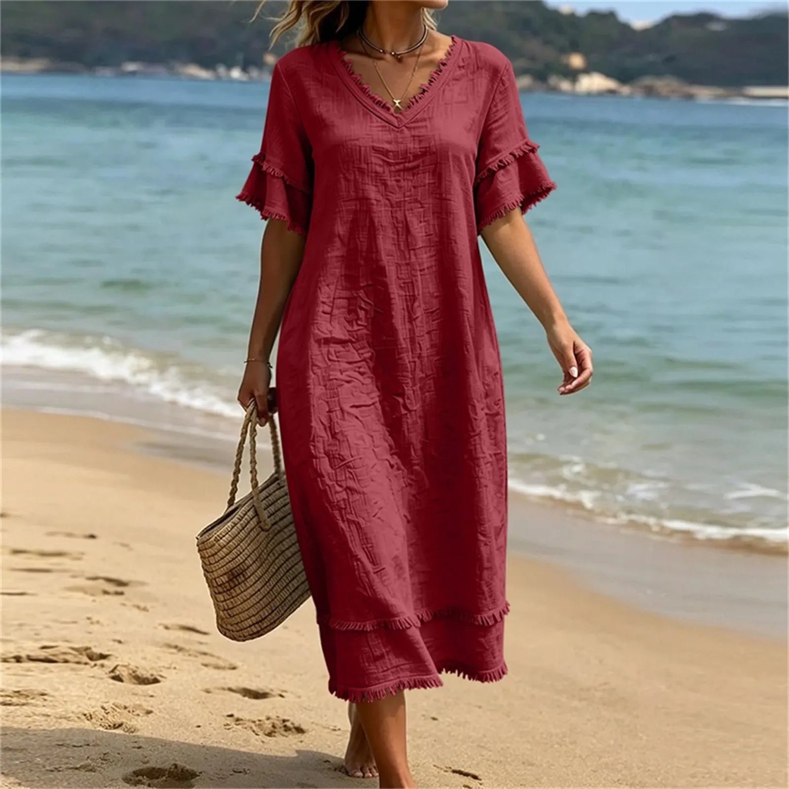 Robe femme bohème col V avec franges et coupe fluide