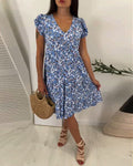 Robe midi sans manches à fleurs avec décolleté en V