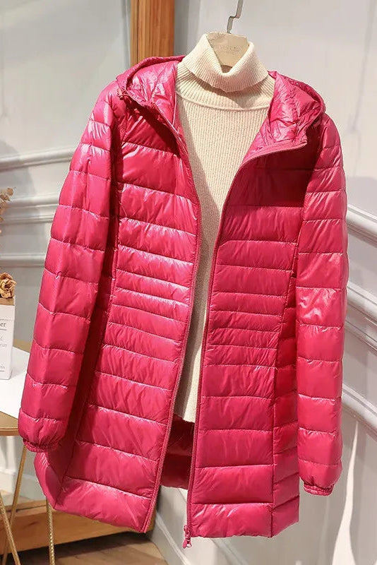 Manteau long matelassé à capuche et fermeture éclair