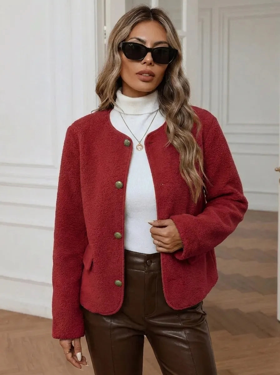 Veste pour femmes avec boutons dorés et poches latérales