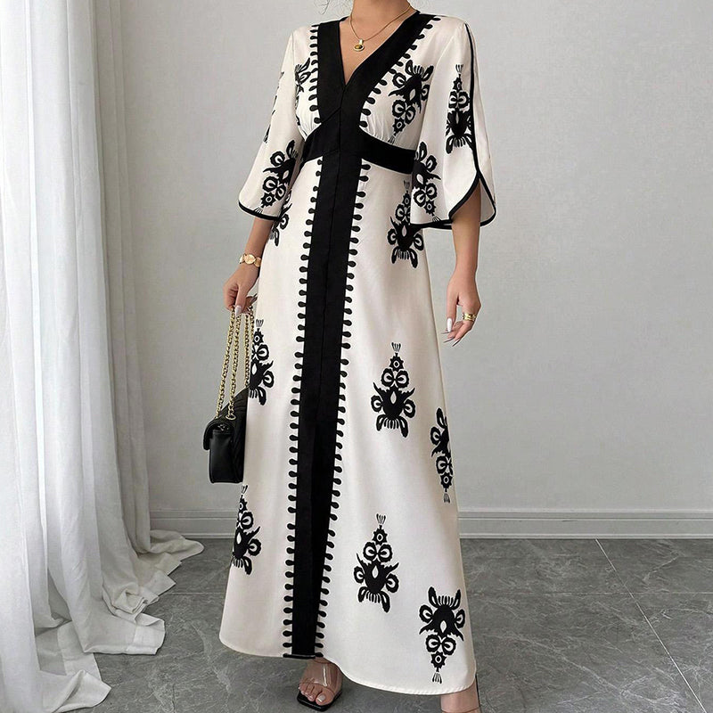 Qoucie | Robe maxi à décolleté en V avec une touche d'été élégante