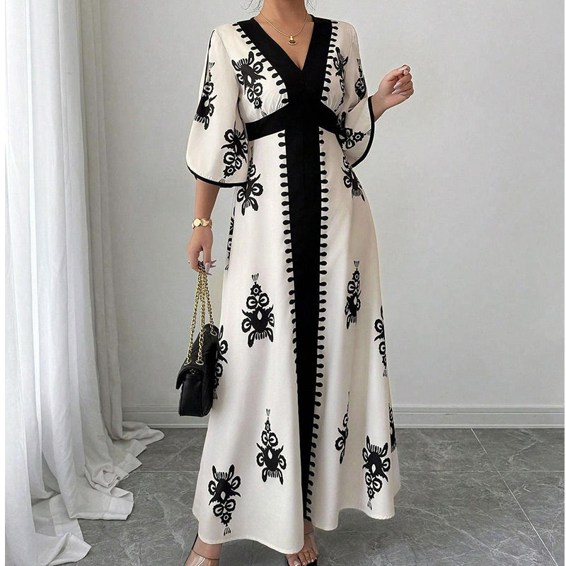 Qoucie | Robe maxi à décolleté en V avec une touche d'été élégante