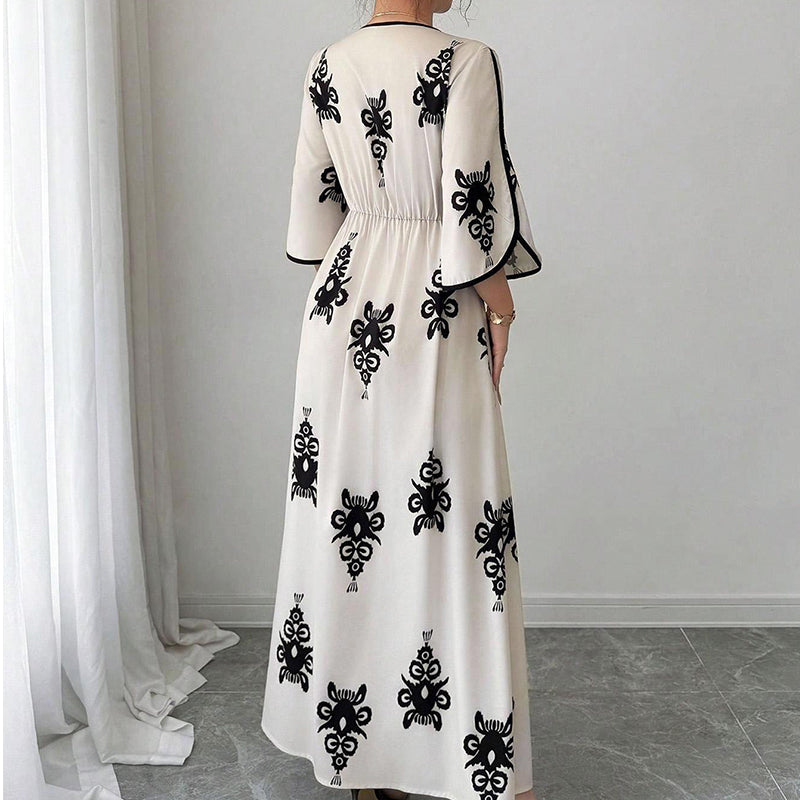Qoucie | Robe maxi à décolleté en V avec une touche d'été élégante