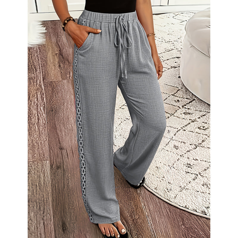 Pantalon femme fluide avec dentelle latérale et cordon