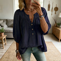 Blouse femme à col V et manches trois-quarts élégantes