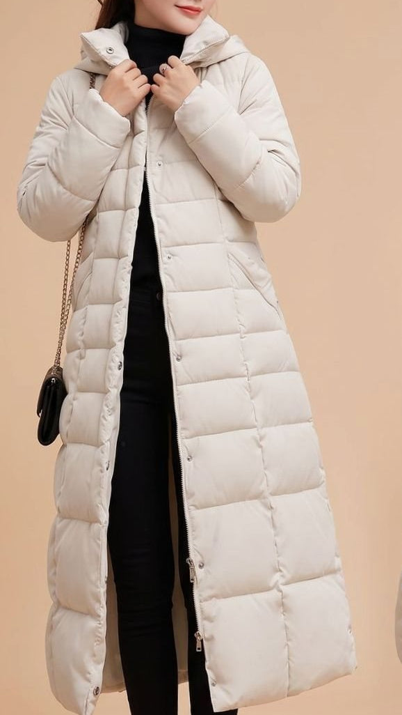 Emilia | Manteau d'hiver femme long matelassé avec capuche et bordure en fausse fourrure