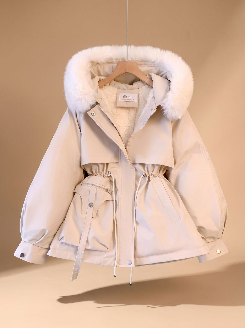 Olivia | Veste doudoune à capuche en fausse fourrure élégante pour femmes