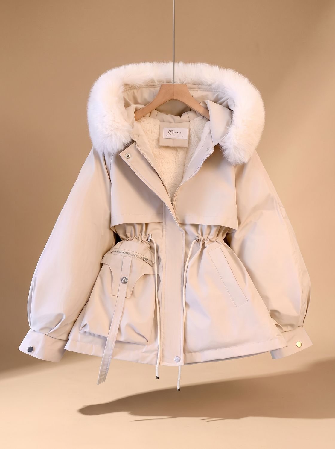 Olivia | Veste doudoune à capuche en fausse fourrure élégante pour femmes