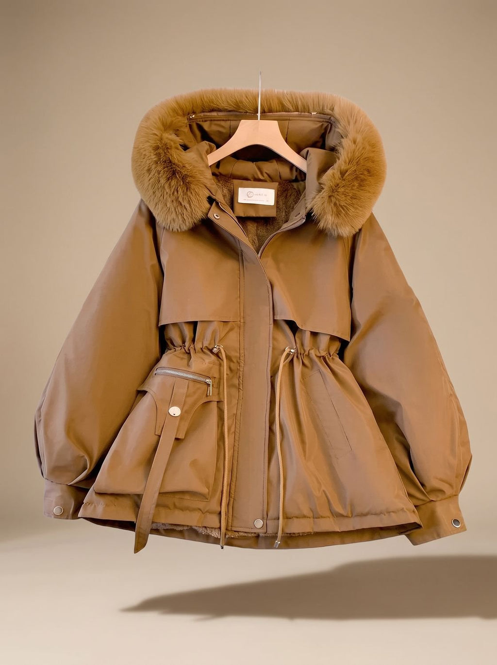 Olivia | Veste doudoune à capuche en fausse fourrure élégante pour femmes