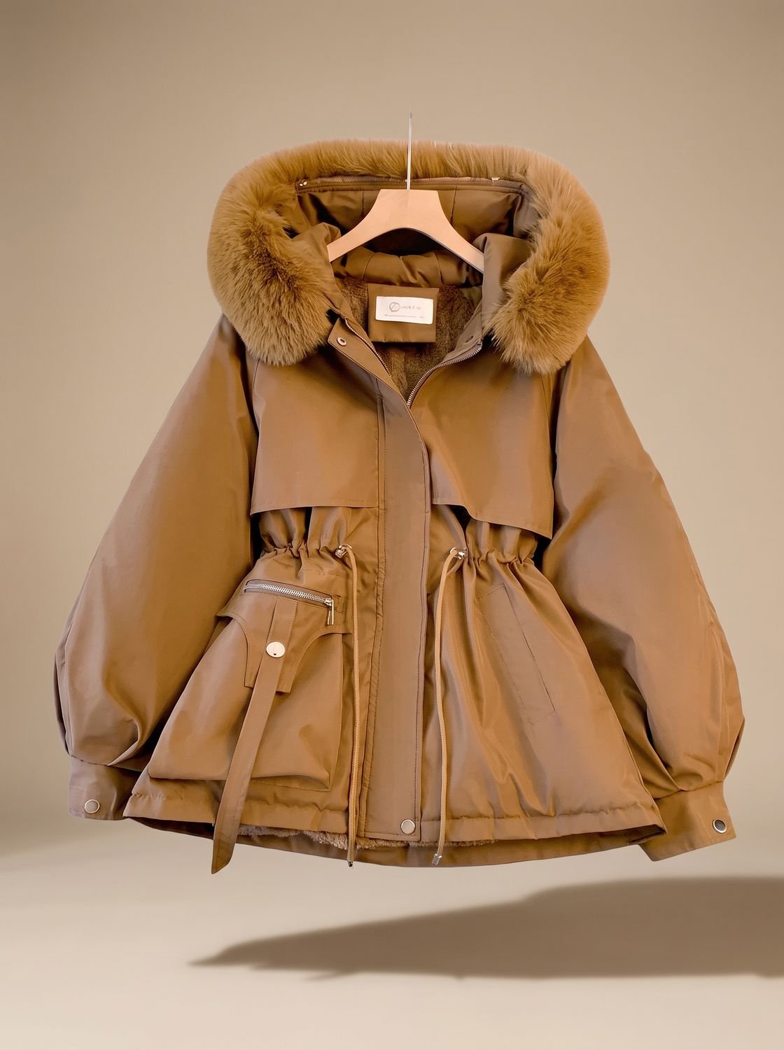 Olivia | Veste doudoune à capuche en fausse fourrure élégante pour femmes