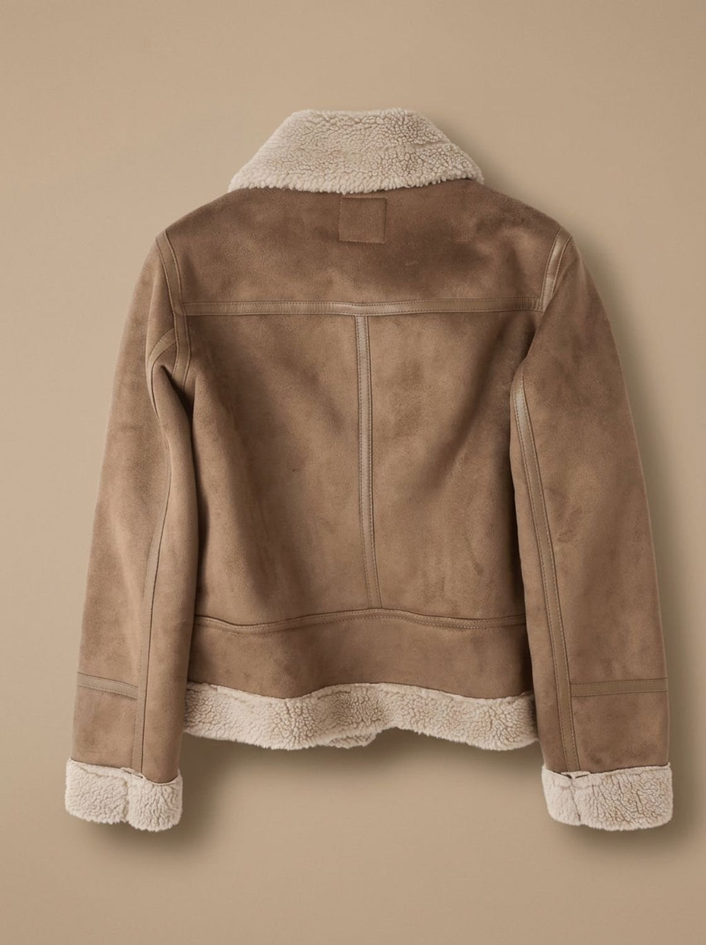 Harper | Veste aviateur pour femmes en fausse fourrure avec ceinture et zip asymétrique